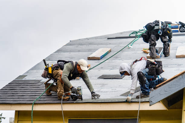 Professional Roofing technician working in York, ME